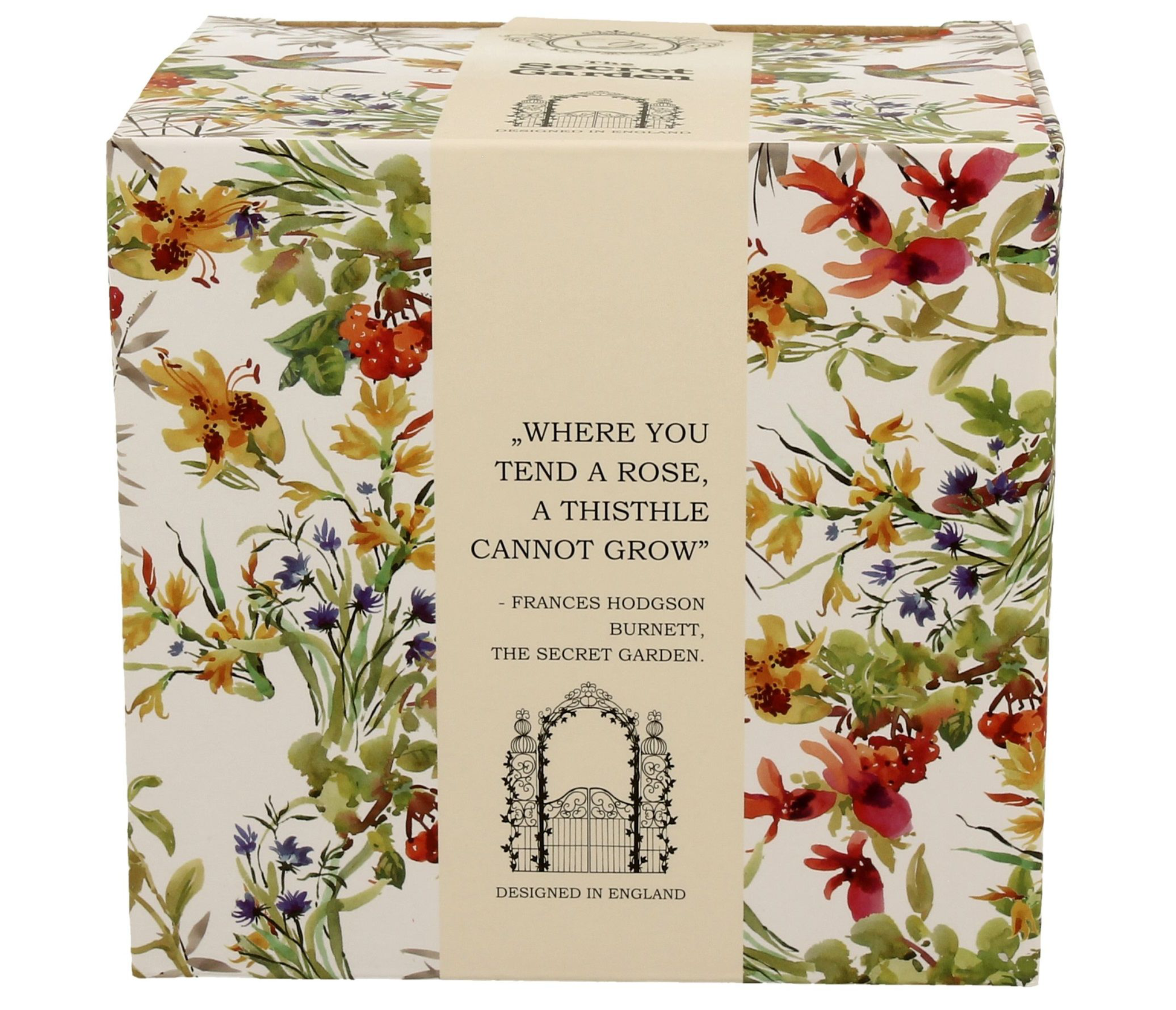 Pudełko prezentowe w kwiaty z cytatem Frances Hodgson Burnett „Where you tend a rose, a thistle cannot grow”.