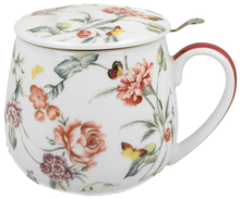 Kubek porcelanowy baryłka Milagros z motywem kwiatowym i pokrywką.