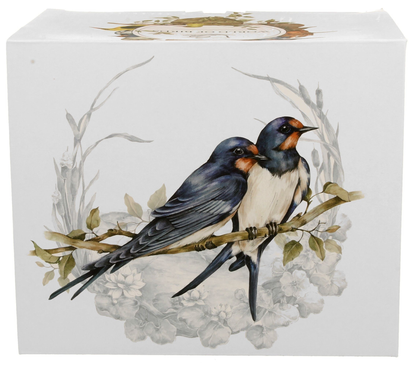 Pudełko prezentowe z kolekcji World of Birds z motywem różnych ptaków, w tym jaskółek.