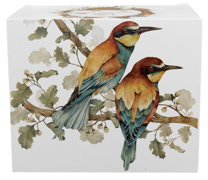 Ilustracja dwóch żołn siedzących na gałęzi na pudełku od kubka.