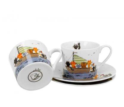 Filiżanki porcelanowe z kolorowym wzorem kotów na żaglówce.