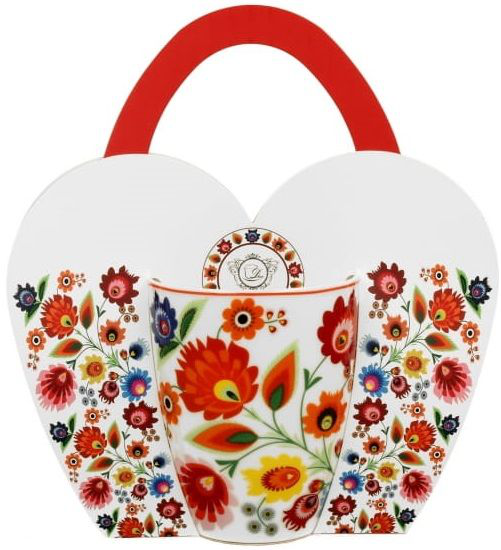 Kubek porcelanowy Łowicz w ozdobnym koszyczku prezentowym.