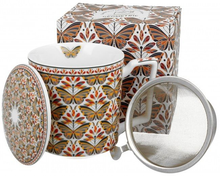 Zestaw kubek porcelanowy Papilo z zaparzaczem, pokrywką i ozdobnym pudełkiem w komplecie.