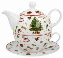 Porcelanowy zestaw Christmas Tree z dzbankiem i filiżanką zdobioną choinką i świątecznymi detalami.