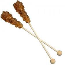 Pałeczki cukrowe z brązowego cukru trzcinowego 17 cm, widok kilku sztuk.
