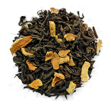 Susz herbaty czerwonej Pu Erh Fresh z dodatkiem mięty syryjskiej, kawałków pomarańczy i skórki cytrynowej.