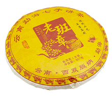Opakowanie herbaty Pu Erh Tea Cake Lao Ban Zhang 357 g w formie tradycyjnego placka.