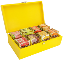 Żółty drewniany ekspozytor Basilur z 80 saszetkami herbaty premium w eleganckim pudełku.