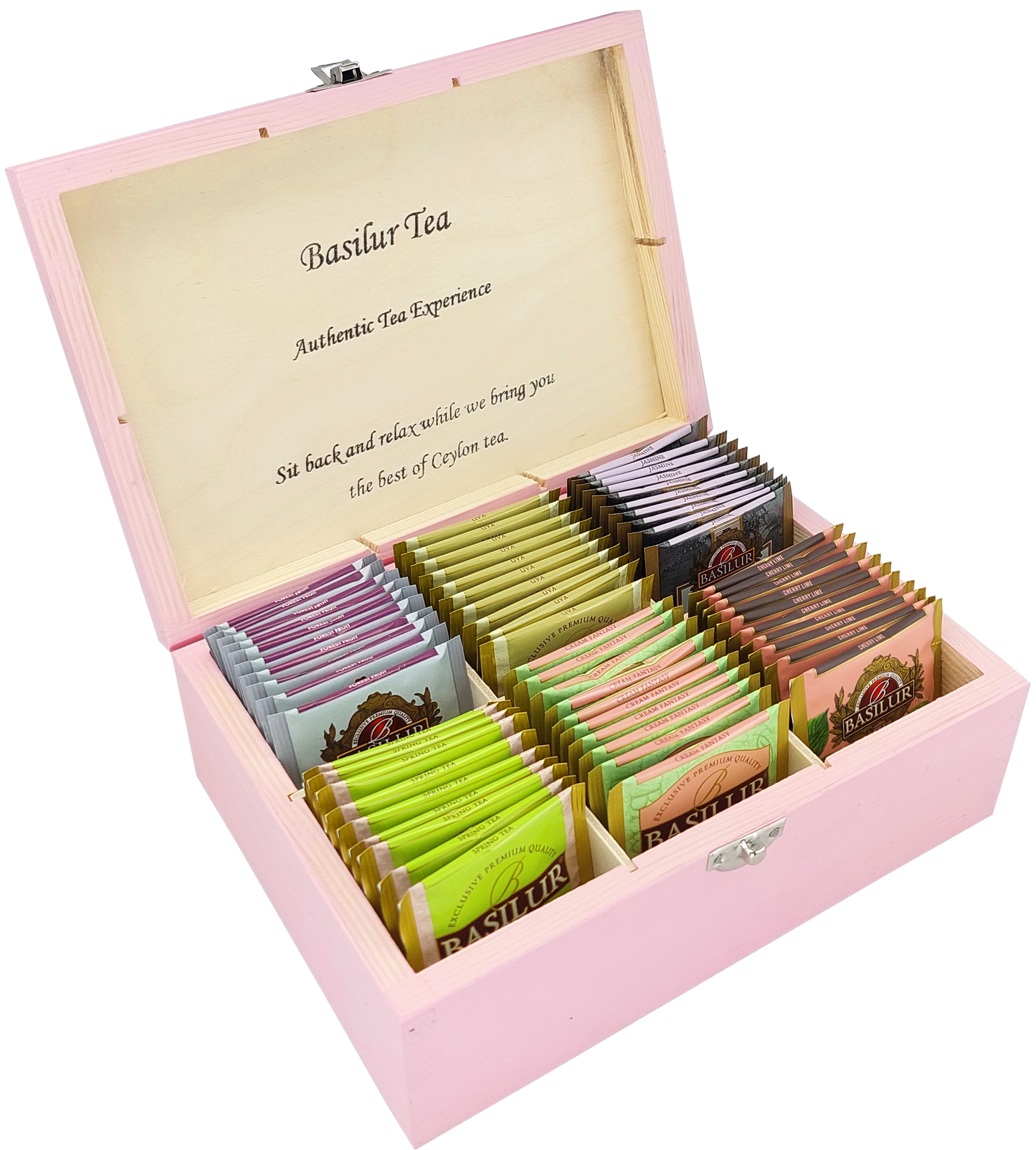 Drewniane pudełko Basilur w różowym kolorze z zestawem herbat w saszetkach.