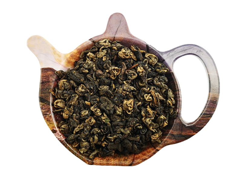 Czarna herbata chińska Black Screw o skręconych listkach zaprezentowana na podstawce w kształcie czajniczka