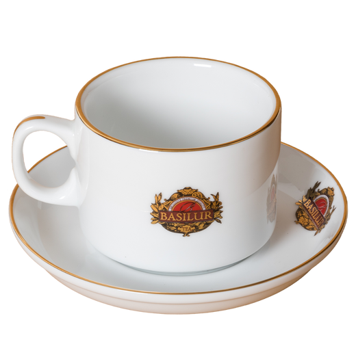 Filiżanka Basilur ze spodkiem, widok z boku, porcelana zdobiona złotym rantem.