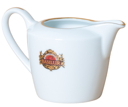 Elegancki mlecznik Basilur z porcelany widok z boku dzióbek i uchwyt