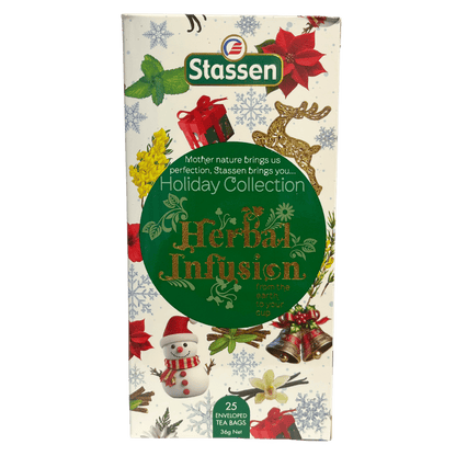 Herbata ziołowa Stassen Holiday Collection 25 kopert, 36 g, w pionowym kremowym pudełku z zieloną etykietą i świątecznymi dekoracjami.