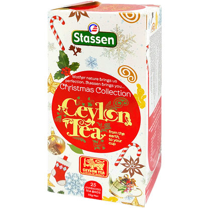 Herbata Stassen Christmas Collection 25 kopert, świąteczne pudełko z bombkami, śnieżynkami i czerwonym logo Ceylon Tea, widok pod kątem.