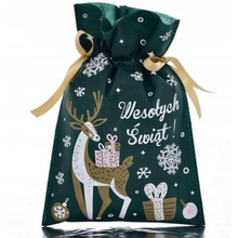 Zielony worek prezentowy z reniferem niosącym prezenty, śnieżynkami i napisem „Wesołych Świąt”, przewiązany złotymi wstążkami.