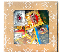 Kartonowe pudełko świąteczne z okienkiem, wypełnione herbatami Basilur i innymi markami.