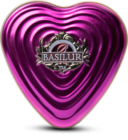 Widok z góry na różową puszkę Basilur Forever Life w kształcie serca, ekskluzywna herbata prezentowa.