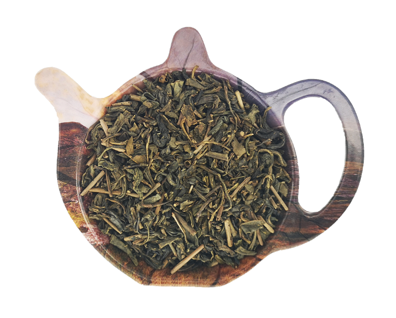 Żółta herbata chińska Huang Da Cha o drobnych liściach na podstawce w kształcie czajniczka