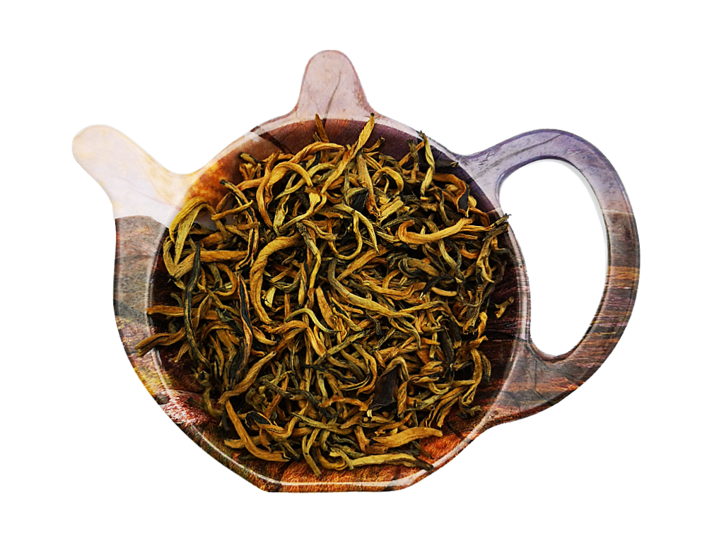 Czarna herbata chińska Golden Prince o złotawych liściach na podstawce w kształcie czajniczka