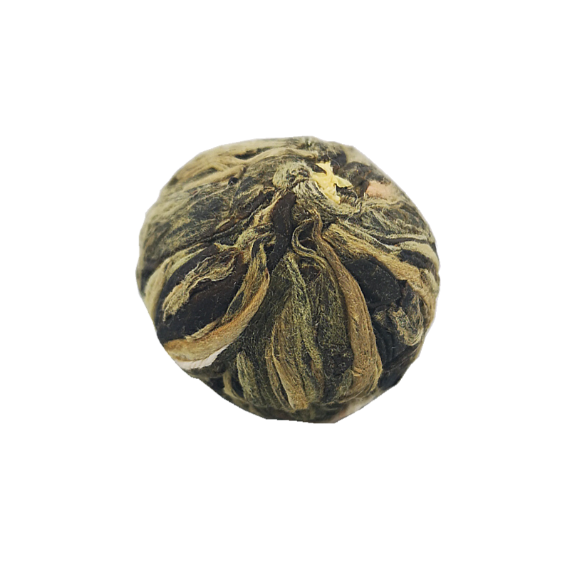 Kulka herbaty rozkwitającej Miłosny Zachód Słońca przed zaparzeniem
