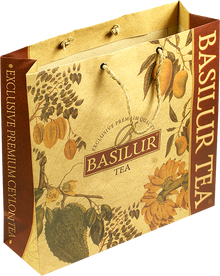 Duża torba prezentowa Basilur z roślinnym motywem i złotymi zdobieniami