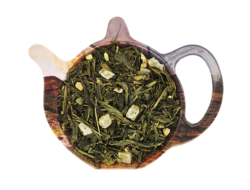 Zielona herbata Sencha Ananas i Imbir z kawałkami ananasa kandyzowanego i imbirem na podstawce w kształcie czajniczka