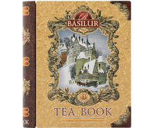 Front opakowania Basilur Tea Book vol. II – złote detale i grafika zimowego zamku.