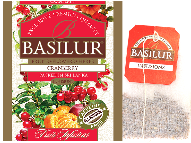 Saszetka herbaty Basilur Cranberry oraz torebka z naparem – owocowa herbata bez kofeiny.