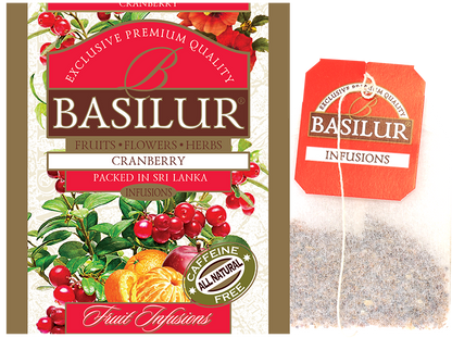 Saszetka herbaty Basilur Cranberry oraz torebka z naparem – owocowa herbata bez kofeiny.