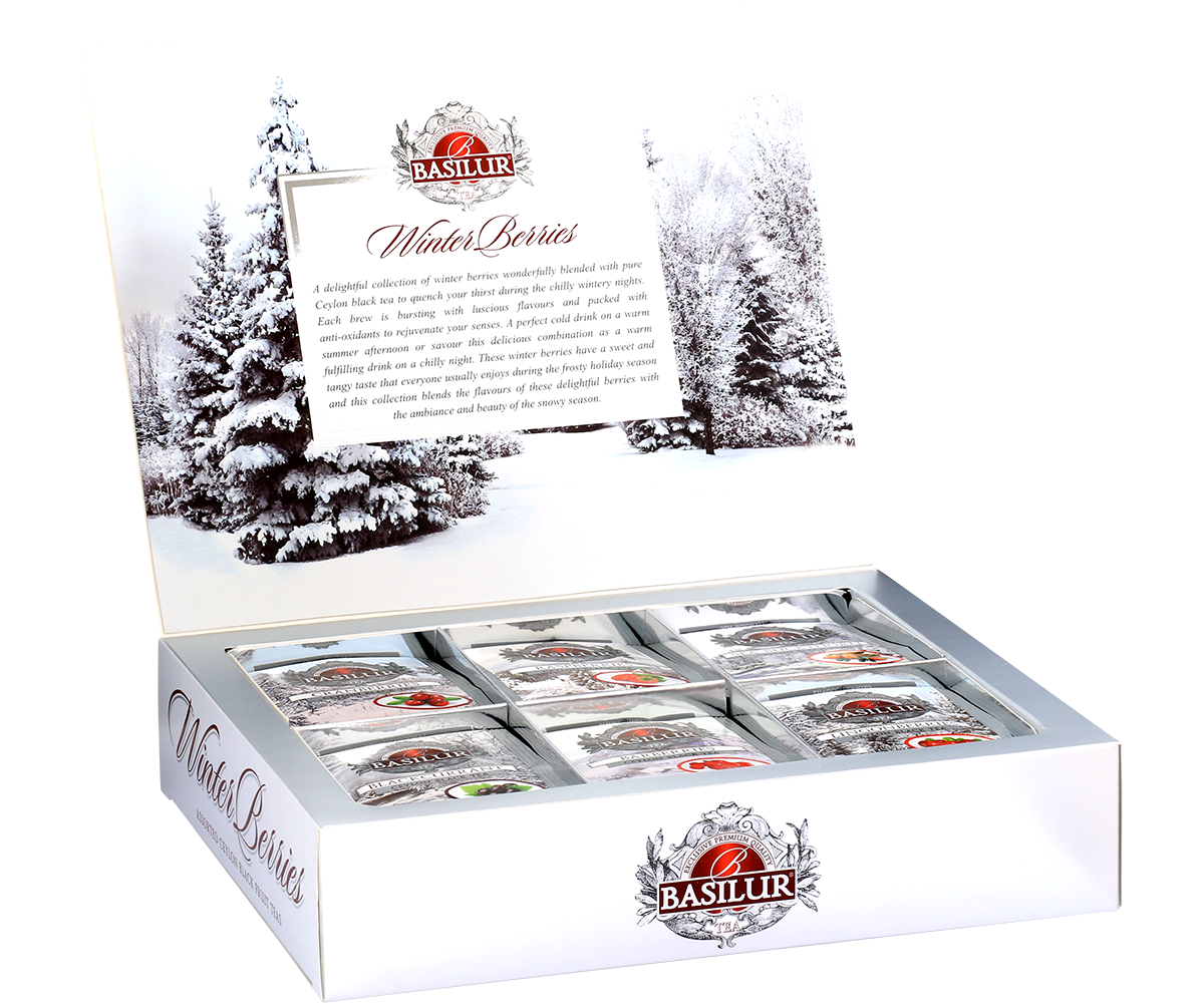 Otwarty zestaw herbat Basilur Winter Berries z widocznymi torebkami herbat w eleganckim pudełku – kolekcja herbat cejlońskich.
