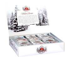 Otwarty zestaw herbat Basilur Winter Berries z widocznymi torebkami herbat w eleganckim pudełku – kolekcja herbat cejlońskich.