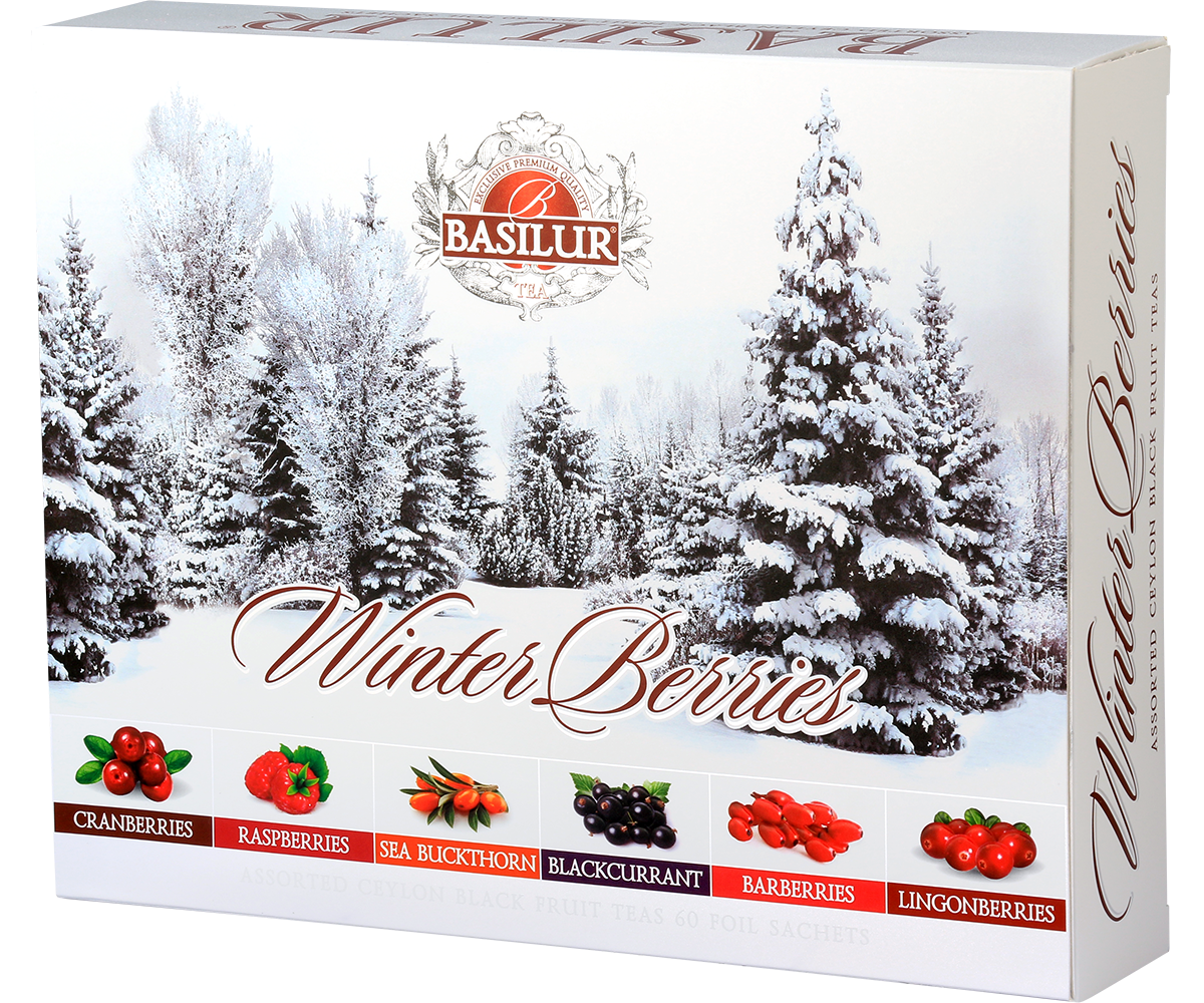 Opakowanie zestawu Basilur Winter Berries z ilustracją ośnieżonego lasu i owoców – herbata czarna owocowa.