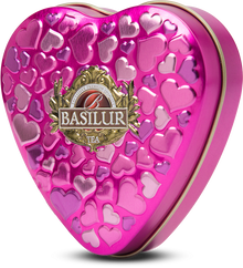 Różowa puszka Basilur Forever Happiness w kształcie serca.