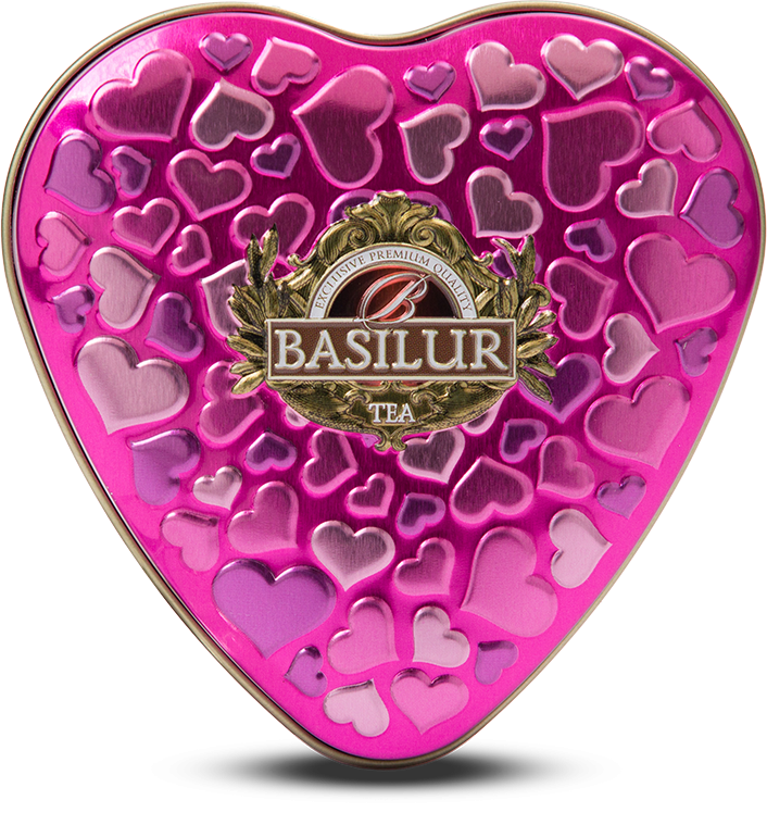 Widok z góry na metalową puszkę w kształcie serca Basilur Forever Happiness.