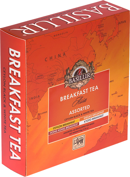 Zestaw herbat Basilur Breakfast Tea Asia – eleganckie opakowanie w odcieniach pomarańczy.