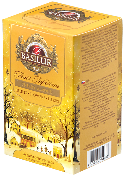Herbata owocowa Basilur Cherry Almond w złotym opakowaniu z zimowym motywem – owocowa herbata z wiśnią i migdałem.