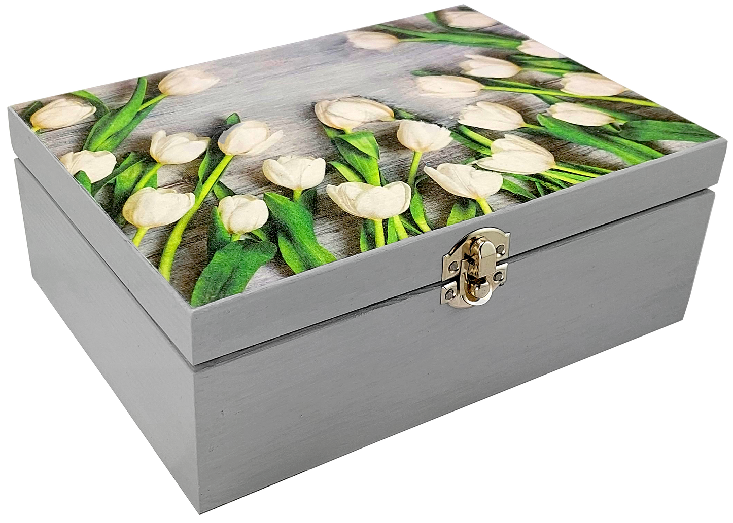 Elegancka zamknięta skrzynka z herbatą Basilur Białe Tulipany, dekorowana tulipanami.