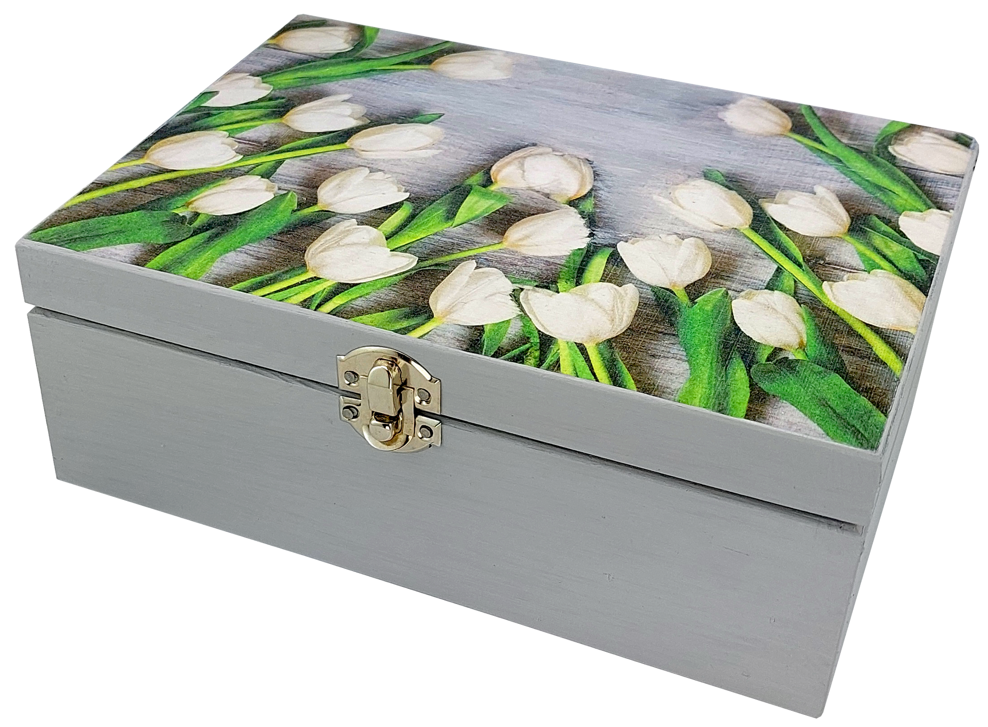 Zbliżenie na pudełko Basilur Białe Tulipany z kwiatowym wzorem i metalowym zapięciem.
